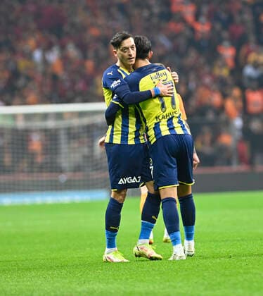 Mesut Ozil and Irfan Can Kahveci of Fenerbahce during the Turkish super league big derby match between Galatasaray and Fenerbahce at NEF stadium in Istanbul , Turkey on November 21, 2021. 