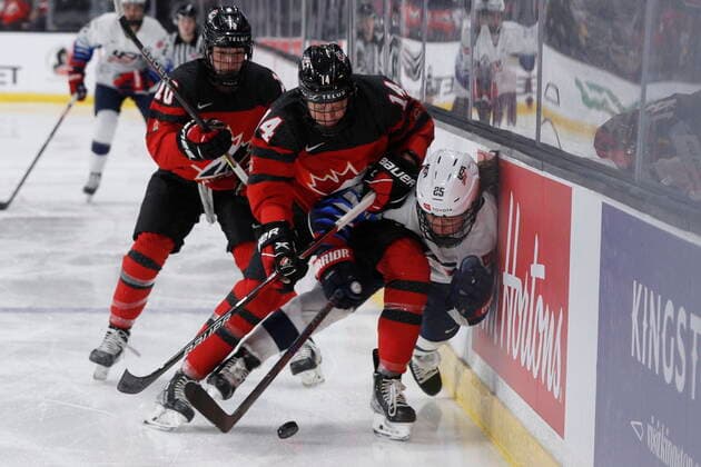 November 21, 2021, Kingston, Ontario, Canada: Canada s Renata Fast (14) chases United States forward Alex Carpenter (25) during first period action of the Rivalry series in Kingston, Ont., Sunday, Nov. 21, 2021. Canada News - November 21, 2021  - ZUMAc35_ 0142511597st Copyright: xLarsxHagbergx