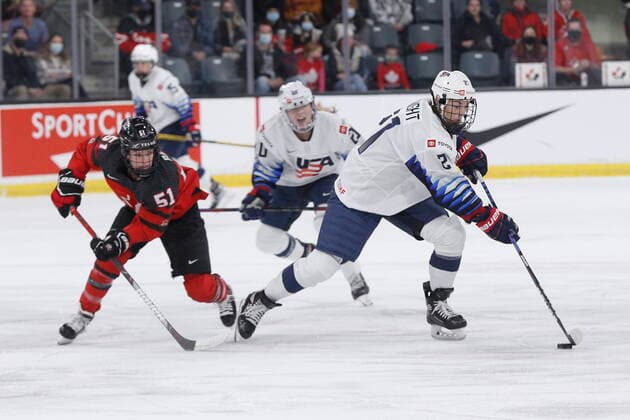 November 21, 2021, Kingston, Ontario, Canada: Canada s Victoria Bach (51) chases United States forward Hilary Knight (21) during first period action of the Rivalry series in Kingston, Ont., Sunday, Nov. 21, 2021. Canada News - November 21, 2021  - ZUMAc35_ 0142511598st Copyright: xLarsxHagbergx