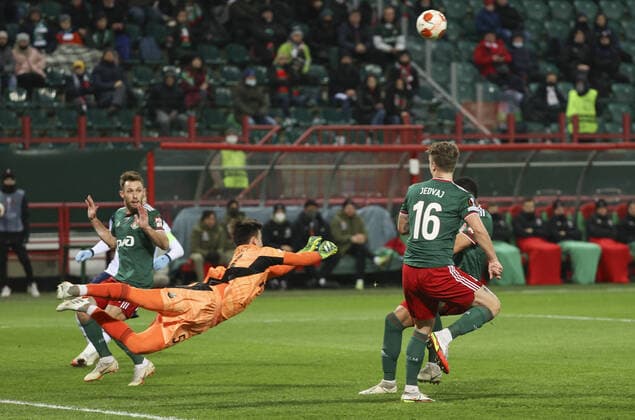 MOSCOW, RUSSIA - NOVEMBER 25, 2021: Lokomotiv Moscow s goalkeeper Daniil Khudyakov (L front) is in action in the 2021 22 UEFA Europa League Group E football match against Lazio at RZD Arena. Anton Novoderezhkin TASS  TS1195C6