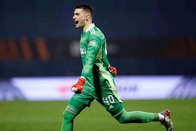 ZAGREB, CROATIA - NOVEMBER 25 : Dominik Livakovic goalkeeper of Dinamo Zagreb celebrates during the UEFA Europa League Group stage H match between Dinamo Zagreb and Krc Genk on November 25, 2021 in Zagreb, Croatia, 25 11 2021 ( Dinamo Zagreb v Krc Genk - UEFA Europa League PhotoNews Panoramic 