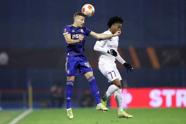 Dinamo Zagreb v KRC Genk: Group H - UEFA Europa League Mislav Orsic of Dinamo Zagreb and Angelo Preciado of Genk gets up for a header during the UEFA Europa League group H match between Dinamo Zagreb and KRC Genk at Maksimir Stadium on November 25, 2021 in Zagreb, Croatia. GoranxStanzl PIXSELL