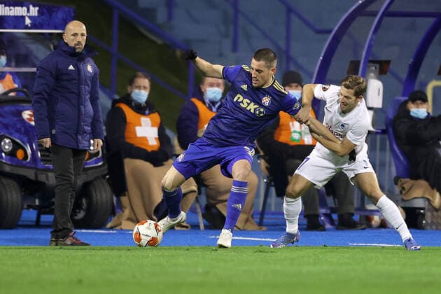 Dinamo Zagreb v KRC Genk: Group H - UEFA Europa League Arijan Ademi of Dinamo Zagreb and Patrik Hrosovsky of Genk in action during the UEFA Europa League group H match between Dinamo Zagreb and KRC Genk at Maksimir Stadium on November 25, 2021 in Zagreb, Croatia. MarkoxPrpic PIXSELL