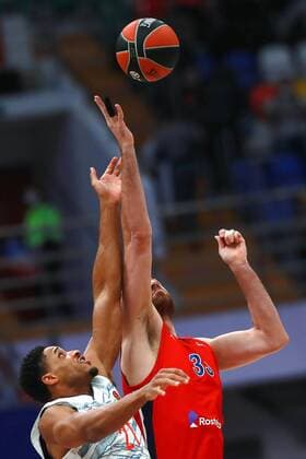 Russia Basketball Euroleague CSKA - Bayern 6704403 25.11.2021 Bayern?s Augustine Rubit and CSKA?s Nikola Milutinov struggle for a ball during the Euroleague basketball match between CSKA Moscow and Bayern Munchen, in Moscow, Russia. Anton Denisov Sputnik Moscow Russia  Copyright: xAntonxDenisovx