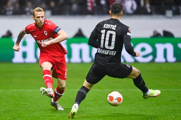 Antwerp s Ritchie De Laet and Eintracht s Filip Kostic fight for the ball during a soccer game between German Eintracht Frankfurt and Belgian Royal Antwerp FC, Thursday 25 November 2021 in Frankfurt, Germany, game five (out of six) in Group D of the UEFA Europa League group stage. LAURIExDIEFFEMBACQ  x3143479x