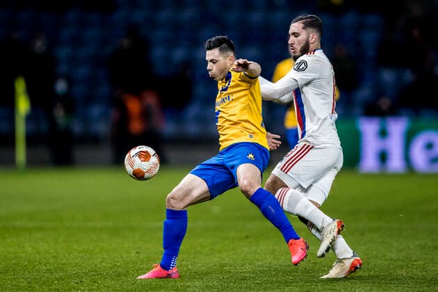 Broendby IF v Lyon, UEFA Europa League, Broendby, Denmark Broendby, Denmark. 25th, November 2021. Rayan Cherki (18) of Lyon and Blas Riveros (15) of Broendby IF seen during the UEFA Europa League match between Broendby IF and Lyon at Broendby Stadion in Broendby. Brondby Denmark  Copyright: xGonzalesxPhoto LassexLagonix