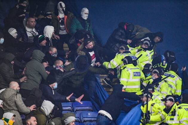Mandatory Credit: Photo by Anna Gowthorpe Shutterstock (12617592aj) Legia Warsaw fans fight police officers Leicester City v Legia Warsaw, UEFA Europa League, Group C, Football, The King Power Stadium, Leicester, UK - 25 Nov 2021 EDITORIAL USE ONLY No use with unauthorised audio, video, data, fixture lists, club league logos or live services. Online in-match use limited to 120 images, no video emulation. No use in betting, games or single club league player publications. Leicester City v Legia Warsaw, UEFA Europa League, Group C, Football, The King Power Stadium, Leicester, UK - 25 Nov 2021 EDITORIAL USE ONLY No use with unauthorised audio, video, data, fixture lists, club league logos or live services. Online in-match use limited to 120 images, no video emulation. No use in betting, games or single club league player publications. Copyright: xAnnaxGowthorpe Shutterstockx 12617592aj