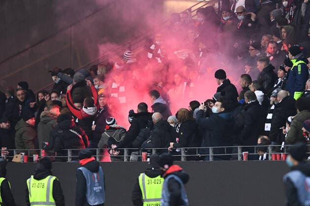 Football Europa League 5 matchday Eintracht Frankfurt Royal Antwerpen FC on 25 11 2021 at Deutsche Bank Park in Frankfurt burning pyro pyrotechnics flares Bengalos thrown by Antwerpen fan block fans into the Frankfurt fan block fans xHDx