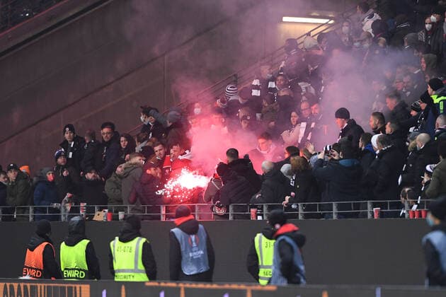 Football Europa League 5 matchday Eintracht Frankfurt Royal Antwerpen FC on 25 11 2021 at Deutsche Bank Park in Frankfurt burning pyro pyrotechnics flares Bengalos thrown by Antwerpen fan block fans into the Frankfurt fan block fans xHDx