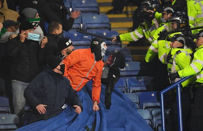 Mandatory Credit: Photo by Anna Gowthorpe Shutterstock (12617592ak) Legia Warsaw fans fight police officers Leicester City v Legia Warsaw, UEFA Europa League, Group C, Football, The King Power Stadium, Leicester, UK - 25 Nov 2021 EDITORIAL USE ONLY No use with unauthorised audio, video, data, fixture lists, club league logos or live services. Online in-match use limited to 120 images, no video emulation. No use in betting, games or single club league player publications. Leicester City v Legia Warsaw, UEFA Europa League, Group C, Football, The King Power Stadium, Leicester, UK - 25 Nov 2021 EDITORIAL USE ONLY No use with unauthorised audio, video, data, fixture lists, club league logos or live services. Online in-match use limited to 120 images, no video emulation. No use in betting, games or single club league player publications. Copyright: xAnnaxGowthorpe Shutterstockx 12617592ak