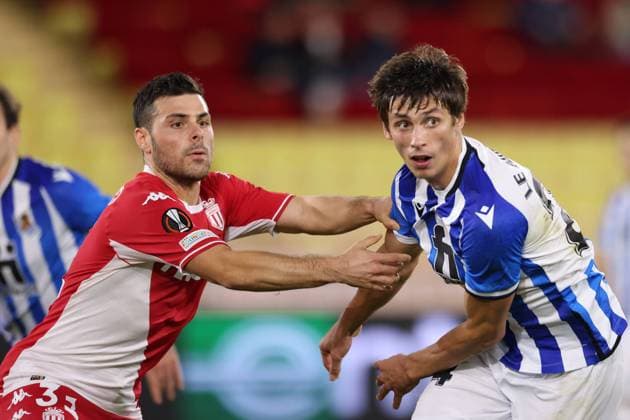 Monaco, Monaco, 25th November 2021. Kevin Volland of AS Monaco tussles with Robin Le Normand of Real Sociedad during the UEFA Europa League match at Stade Louis II, Monaco. Picture credit should read: Jonathan Moscrop Sportimage EDITORIAL USE ONLY. No use with unauthorised audio, video, data, fixture lists, club league logos or live services. Online in-match use limited to 120 images, no video emulation. No use in betting, games or single club league player publications. SPI-1343-0017