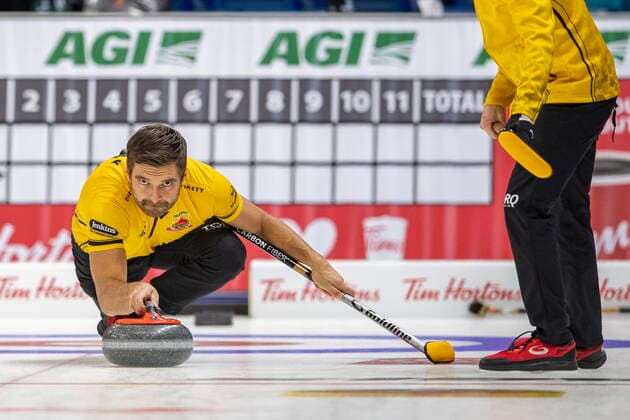 November 26, 2021, Saskatoon, SK, Canada: Team Gunnlaugson second Matt Wozniak throws against Team Koe during Draw 16 of the 2021 Canadian Olympic curling trials in Saskatoon, Friday, November 26, 2021. Matt Wozniak  - ZUMAc35_ 20211126_zaf_c35_013 Copyright: xLiamxRichardsx