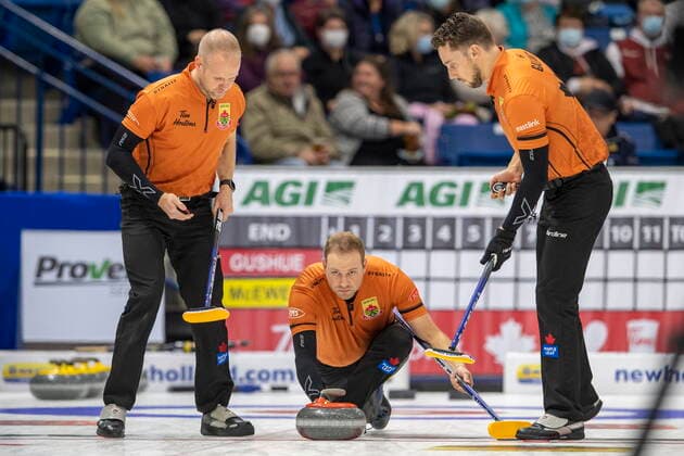 November 26, 2021, Saskatoon, SK, Canada: Team Gushue lead Geoff Walker throws against Team McEwen during Draw 18 of the 2021 Canadian Olympic curling trials in Saskatoon, Friday, November 26, 2021. Geoff Walker  - ZUMAc35_ 20211126_zaf_c35_225 Copyright: xLiamxRichardsx