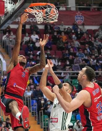 Russia Basketball Euroleague CSKA - Panathinaikos 6711466 02.12.2021 CSKA s Nikola Milutinov watches as CSKA s Joel Bolomboy puts up the shot during the Euroleague basketball match between CSKA Moscow and Panathinaikos Athens in Moscow, Russia. Alexander Vilf Sputnik Moscow Russia  Copyright: xAlexanderxVilfx