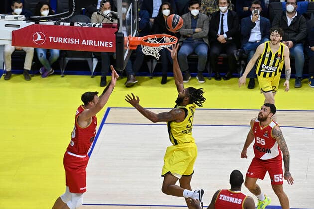 Devin Booker of Fenerbahce Beko Istanbul and Donatas Motiejunas (20) , Mike James (R) AS Monaco during the Turkish Airlines Euroleague Basketball match between Fenerbahce Beko Istanbul and AS Monaco at Ulker Arena in Istanbul , Turkey on December 02 , 2021. 