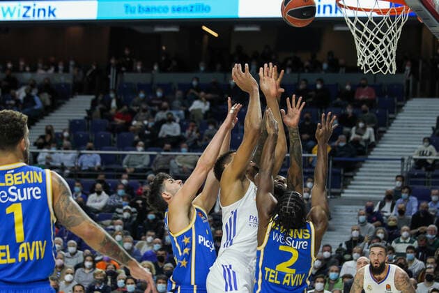 December 2, 2021, MADRID, MADRID, SPAIN: Angelo Caloiaro of Maccabi Tel Aviv, Walter Samuel Tavares da Veiga of Real Madrid and Angelo Caloiaro of Maccabi Tel Aviv fight for the ball during Turkish Airlines EuroLeague basketball match played between Real Madrid and Maccabi Tel Aviv at Wizink Center on December 2, 2021, in Madrid, Spain. MADRID SPAIN - ZUMAa181 20211202_zaa_a181_111 Copyright: xIrinaxR.xHipolitox