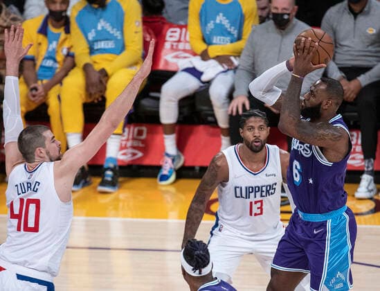 December 3, 2021, Los Angeles, California, USA: LeBron James 6 of the Los Angeles Lakers puts a jump shot over Ivica Zubac 40 of the Los Angeles Clippers during their regular season NBA, Basketball Herren, USA game on Friday December 3, 2021 at the Staples Center in Los Angeles, California. Lakers lose to Clippers, 115-119. PI Los Angeles USA - ZUMAp124 20211203_zaa_p124_027 Copyright: xJAVIERxROJASx