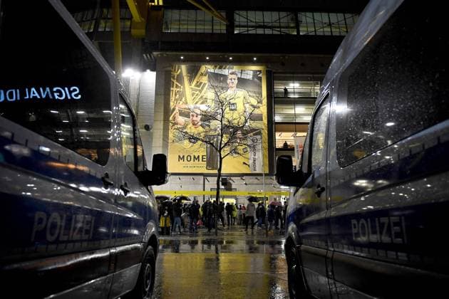 Football 1 Bundesliga, Matchday 14, Borussia Dortmund FC Bayern Munich on 04 12 2021 at Signal Iduna Park in Dortmund North Rhine Westphalia Two police cars are parked in front of the Westfalenstadion at the North Stand DFL REGULATES PROHIBIT ANY USE OF PHOTOGRAPHS AS IMAGE SEQUENCES AND OR QUASI VIDEO Copyright: xChristopherxNeundorfx