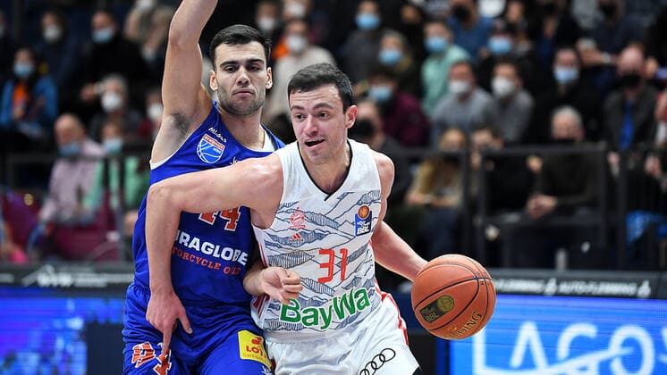 Basketball, 1 Bundesliga, Season 2021 2022, 9 Matchday, SYNTAINICS MBC Mitteldeutscher Basketball Club Weissenfels vs FC Bayern Muenchen Basketball 04 12 2021 Duel for the ball between Zan Sisko Guard Bayern Muenchen, back number 31 r and Nikola Rebic Guard MBC Weissenfels, back number 44 li during the match Weißenfels vs FC Bayern Munich Basketball 04 12 2021 Weißenfels Sachsen Anhalt Germany Stadthalle Weißenfels