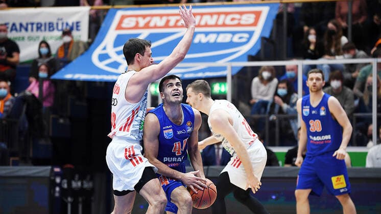 Basketball, 1 Bundesliga, Season 2021 2022, 9 Matchday, SYNTAINICS MBC Mitteldeutscher Basketball Club Weissenfels vs FC Bayern Muenchen Basketball 04 12 2021 Duel for the ball between Nikola Rebic Guard MBC Weissenfels, back number 44 and Zan Sisko Guard Bayern Muenchen, back number 31 li during the match Weißenfels vs FC Bayern Munich Basketball 04 12 2021 Weißenfels Sachsen Anhalt Germany Stadthalle Weißenfels