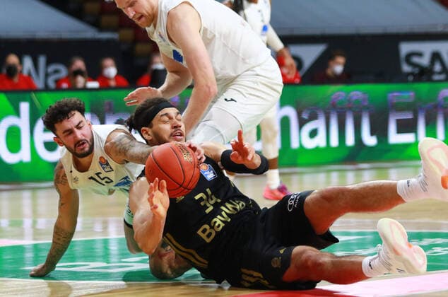 34 Gavin Schilling FCBB sw vs 15 Jordan Geist MLP Academics Heidelberg Basketball BBL FC Bayern Munich vs MLP Academics Heidelberg, at Audi Dome on 06 12 2021 PHOTO Mladen Lackovic LakoPress