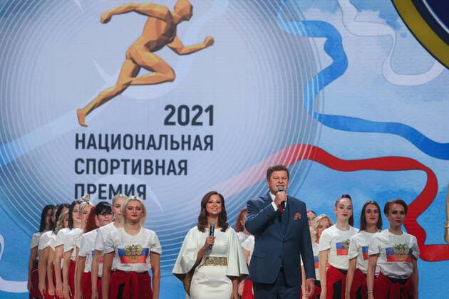 MOSCOW, RUSSIA - DECEMBER 8, 2021: Rhythmic gymnast Yana Batyrshina and TV presenter Dmitry Guberniev (L-R centre) host a ceremony for the 2021 Russian National Sports Awards takes place at Irina Viner-Usmanova Gymnastics Palace. Established in 2010 and coming with a million-rouble prize, the award is given to athletes, coaches, journalists and regional government officials who contributed to the promotion of Russian sports. Gavriil Grigorov TASS  0144158526st