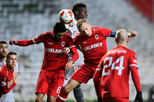 ANTWERPEN, BELGIUM - DECEMBER 09 : Ritchie De Laet defender of Antwerp FC and Almeida Dinis Da Costa Lima defender of Antwerp FC heading a ball during the UEFA Europa League Group Stage - Group D match between Antwerp FC and Olympiacos FC at the Bosuil stadium on December 09, 2021 in Antwerpen, Belgium, 9 12 2021 ( Antwerp FC v Olympiacos FC : UEFA Europa League PhotoNews Panoramic 