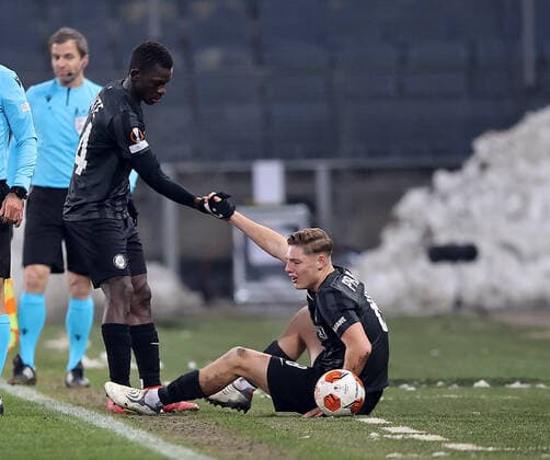 SOCCER - UEFA EL, Sturm vs Monaco GRAZ,AUSTRIA,09.DEC.21 - SOCCER - UEFA Europa League, group stage, SK Sturm Graz vs AS Monaco. Image shows Amadou Dante and Alexander Prass (Sturm).  GEPAxpictures xMJxPaul