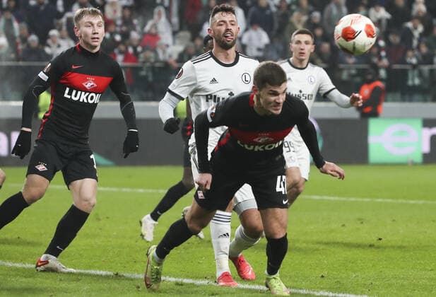 WARSAW, POLAND - DECEMBER 9, 2021: Spartak s Nail Umyarov and Roman Zobnin (L-R front) in action in the 2021 22 UEFA Europa League Group C Round 6 match between Spartak Moscow and Legia Warsaw at the Marshall Jozef Pilsudski s Municipal Stadium of Legia Warsaw. Alexander Demianchuk TASS  TS11B4C3