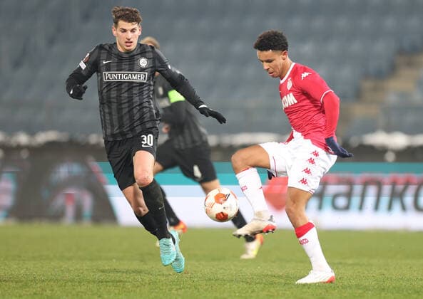 SOCCER - UEFA EL, Sturm vs Monaco GRAZ,AUSTRIA,09.DEC.21 - SOCCER - UEFA Europa League, group stage, SK Sturm Graz vs AS Monaco. Image shows Ivan Ljubic (Sturm) and Wilson Isidor (Monaco) .  GEPAxpictures xChrisxBauer