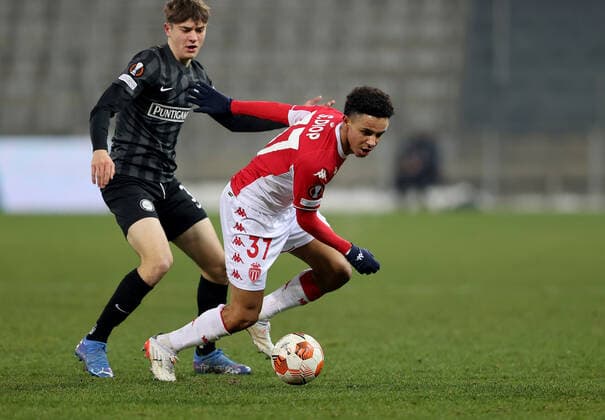 SOCCER - UEFA EL, Sturm vs Monaco GRAZ,AUSTRIA,09.DEC.21 - SOCCER - UEFA Europa League, group stage, SK Sturm Graz vs AS Monaco. Image shows Sofiane Diop (Monaco) and Moritz Wels (Sturm).  GEPAxpictures xMJxPaul