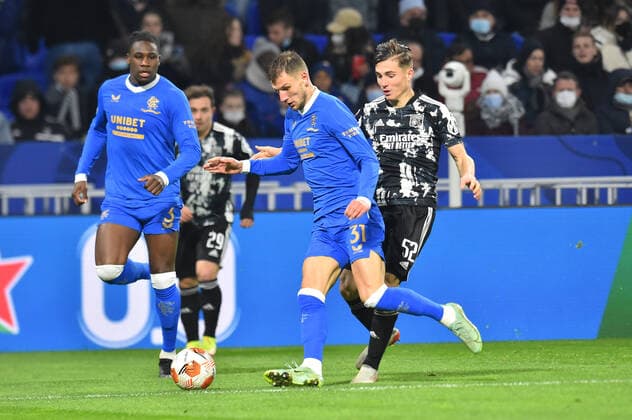 Hugo Vogel (lyon) vs Borna Barisic (rangers) FOOTBALL: Olympique Lyonnais vs Rangers FC - Ligue Europa - 09 12 2021 FredericChambert Panoramic 