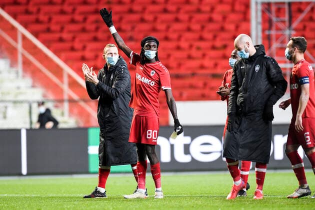 Antwerp s Ritchie De Laet and Antwerp s Pierre Junior Dwomoh celebrate after winning an Europa League game between Belgian soccer team Royal Antwerp FC and Greek soccer team Olympiacos F.C., Thursday 09 December 2021, in Antwerp, Belgium, on the sixth and last day in Group D of the UEFA Europa League group stage. TOMxGOYVAERTS  x3152980x