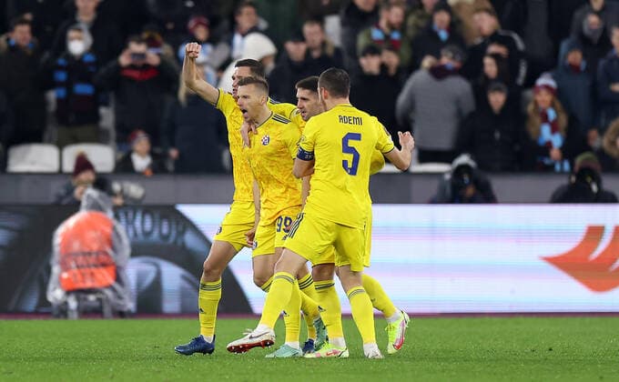 Mandatory Credit: Photo by Simon Dael Shutterstock (12637595y) Mislav Orsic of Dinamo Zagreb celebrates scoring a goal to make the score 0-1 West Ham United v Dinamo Zagreb, UEFA Europa League, Group H, Football, London Stadium, London, UK - 09 Dec 2021 EDITORIAL USE ONLY No use with unauthorised audio, video, data, fixture lists, club league logos or live services. Online in-match use limited to 120 images, no video emulation. No use in betting, games or single club league player publications. West Ham United v Dinamo Zagreb, UEFA Europa League, Group H, Football, London Stadium, London, UK - 09 Dec 2021 EDITORIAL USE ONLY No use with unauthorised audio, video, data, fixture lists, club league logos or live services. Online in-match use limited to 120 images, no video emulation. No use in betting, games or single club league player publications.  Copyright: xSimonxDael Shutterstockx 12637595y