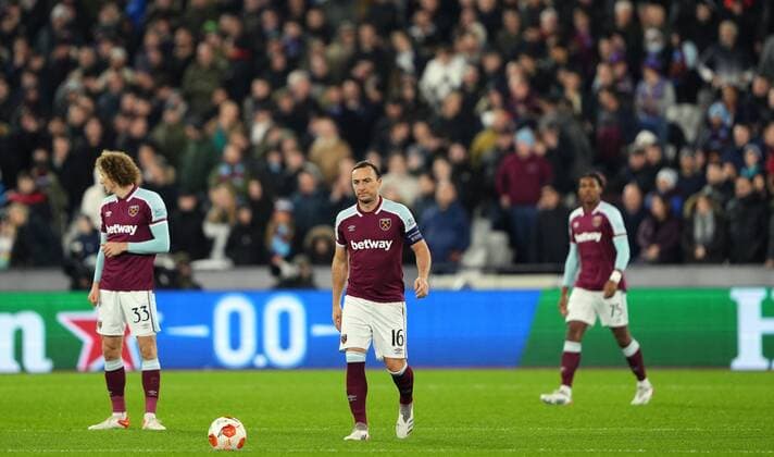 Mandatory Credit: Photo by Jed Leicester Shutterstock (12637592t) Mark Noble of West Ham shows a look of dejection after Mislav Orsic of Dinamo Zagreb scores a goal to make the score 0-1 West Ham United v Dinamo Zagreb, UEFA Europa League, Group H, Football, London Stadium, London, UK - 09 Dec 2021 EDITORIAL USE ONLY No use with unauthorised audio, video, data, fixture lists, club league logos or live services. Online in-match use limited to 120 images, no video emulation. No use in betting, games or single club league player publications. West Ham United v Dinamo Zagreb, UEFA Europa League, Group H, Football, London Stadium, London, UK - 09 Dec 2021 EDITORIAL USE ONLY No use with unauthorised audio, video, data, fixture lists, club league logos or live services. Online in-match use limited to 120 images, no video emulation. No use in betting, games or single club league player publications.  Copyright: xJedxLeicester Shutterstockx 12637592t
