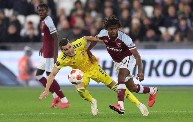Mandatory Credit: Photo by Simon Dael Shutterstock (12637595ad) Komnen Andric of Dinamo Zagreb and Aji Alese of West Ham in action West Ham United v Dinamo Zagreb, UEFA Europa League, Group H, Football, London Stadium, London, UK - 09 Dec 2021 EDITORIAL USE ONLY No use with unauthorised audio, video, data, fixture lists, club league logos or live services. Online in-match use limited to 120 images, no video emulation. No use in betting, games or single club league player publications. West Ham United v Dinamo Zagreb, UEFA Europa League, Group H, Football, London Stadium, London, UK - 09 Dec 2021 EDITORIAL USE ONLY No use with unauthorised audio, video, data, fixture lists, club league logos or live services. Online in-match use limited to 120 images, no video emulation. No use in betting, games or single club league player publications.  Copyright: xSimonxDael Shutterstockx 12637595ad