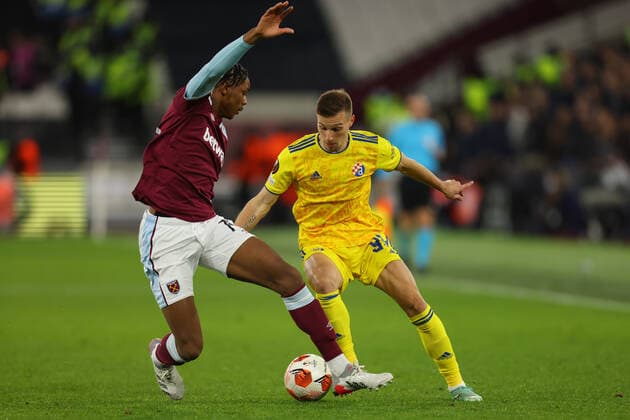 9th December 2021; London Stadium, London, England; Europa League football West Ham versus Dinamo Zagreb; Mislav Or& x161;i& x107; of GNK Dinamo Zagreb takes on Jamal Baptiste of West Ham United  ActionPlus12346568 ShaunxBrooks