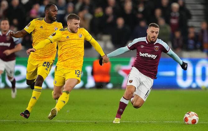 Mandatory Credit: Photo by Jed Leicester Shutterstock (12637592av) Stefan Ristovski of Dinamo Zagreb and Nikola Vlasic of West Ham in action West Ham United v Dinamo Zagreb, UEFA Europa League, Group H, Football, London Stadium, London, UK - 09 Dec 2021 EDITORIAL USE ONLY No use with unauthorised audio, video, data, fixture lists, club league logos or live services. Online in-match use limited to 120 images, no video emulation. No use in betting, games or single club league player publications. West Ham United v Dinamo Zagreb, UEFA Europa League, Group H, Football, London Stadium, London, UK - 09 Dec 2021 EDITORIAL USE ONLY No use with unauthorised audio, video, data, fixture lists, club league logos or live services. Online in-match use limited to 120 images, no video emulation. No use in betting, games or single club league player publications.  Copyright: xJedxLeicester Shutterstockx 12637592av