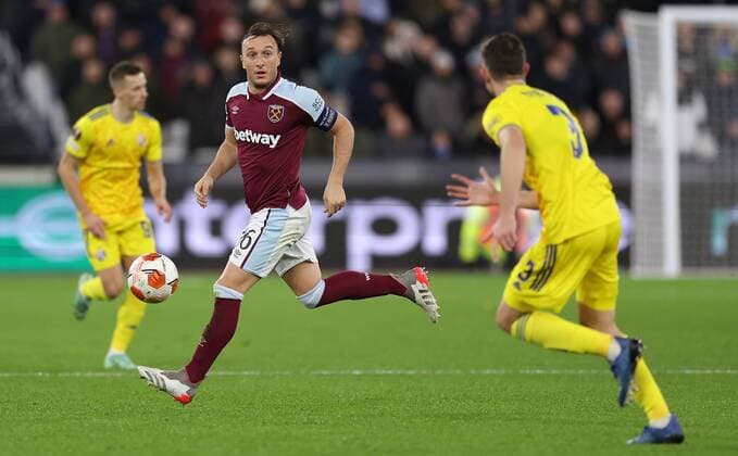 Mandatory Credit: Photo by Simon Dael Shutterstock (12637595ao) Mark Noble of West Ham West Ham United v Dinamo Zagreb, UEFA Europa League, Group H, Football, London Stadium, London, UK - 09 Dec 2021 EDITORIAL USE ONLY No use with unauthorised audio, video, data, fixture lists, club league logos or live services. Online in-match use limited to 120 images, no video emulation. No use in betting, games or single club league player publications. West Ham United v Dinamo Zagreb, UEFA Europa League, Group H, Football, London Stadium, London, UK - 09 Dec 2021 EDITORIAL USE ONLY No use with unauthorised audio, video, data, fixture lists, club league logos or live services. Online in-match use limited to 120 images, no video emulation. No use in betting, games or single club league player publications.  Copyright: xSimonxDael Shutterstockx 12637595ao