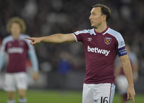 Mandatory Credit: Photo by James GriffithsWest Ham United Shutterstock (12637613y) Mark Noble of West Ham United in action West Ham United v Dinamo Zagreb, UEFA Europa League, Group H, Football, London Stadium, London, UK - 09 Dec 2021 EDITORIAL USE ONLY No use with unauthorised audio, video, data, fixture lists, club league logos or live services. Online in-match use limited to 120 images, no video emulation. No use in betting, games or single club league player publications. West Ham United v Dinamo Zagreb, UEFA Europa League, Group H, Football, London Stadium, London, UK - 09 Dec 2021 EDITORIAL USE ONLY No use with unauthorised audio, video, data, fixture lists, club league logos or live services. Online in-match use limited to 120 images, no video emulation. No use in betting, games or single club league player publications.  Copyright: xJamesxGriffithsWestxHamxUnited Shutterstockx 12637613y