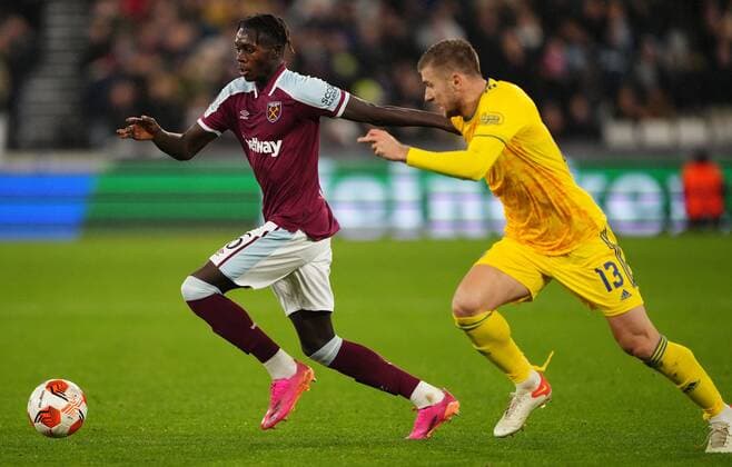 Mandatory Credit: Photo by Jed Leicester Shutterstock (12637592ba) Emmanuel Longelo of West Ham and Stefan Ristovski of Dinamo Zagreb in action West Ham United v Dinamo Zagreb, UEFA Europa League, Group H, Football, London Stadium, London, UK - 09 Dec 2021 EDITORIAL USE ONLY No use with unauthorised audio, video, data, fixture lists, club league logos or live services. Online in-match use limited to 120 images, no video emulation. No use in betting, games or single club league player publications. West Ham United v Dinamo Zagreb, UEFA Europa League, Group H, Football, London Stadium, London, UK - 09 Dec 2021 EDITORIAL USE ONLY No use with unauthorised audio, video, data, fixture lists, club league logos or live services. Online in-match use limited to 120 images, no video emulation. No use in betting, games or single club league player publications.  Copyright: xJedxLeicester Shutterstockx 12637592ba