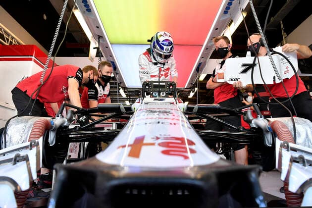 RAEIKKOENEN Kimi F1 Team Alfa Romeo Ferrari gets into his car at the Alfa Romeo Garage F1 FIA Grand Prix of Abu Dhabi 2021 on 09 12 2021 in the UAE at the Yas Marina Circuit