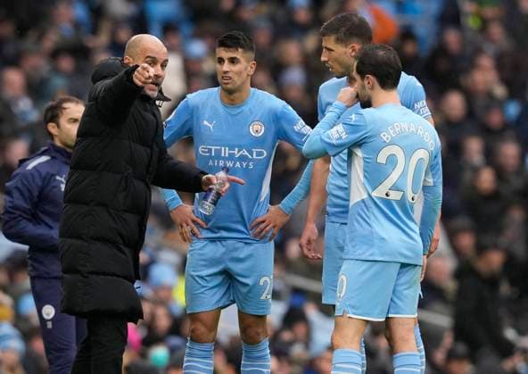 Manchester, England, 11th December 2021. Josep Guardiola manager of Manchester City coaches his players during the Premier League match at the Etihad Stadium, Manchester. Picture credit should read: Andrew Yates Sportimage EDITORIAL USE ONLY. No use with unauthorised audio, video, data, fixture lists, club league logos or live services. Online in-match use limited to 120 images, no video emulation. No use in betting, games or single club league player publications. SPI-1393-0039