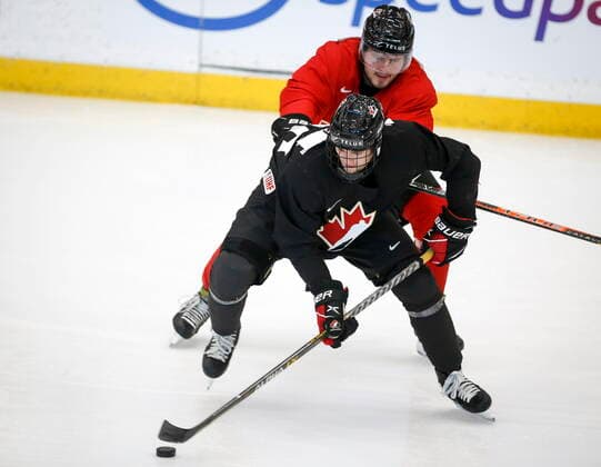 December 11, 2021, Calgary, AB, CANADA: Shane Wright, left, and Mason McTavish skate during a practice at the Canadian World Junior Hockey Championships selection camp in Calgary, Alta., Saturday, Dec. 11, 2021. Shane Wright, Mason McTavish  - ZUMAc35_ 20211211_zaf_c35_027 Copyright: xJeffxMcintoshx
