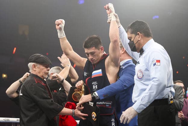 Sport Themen der Woche KW49 YEKATERINBURG, RUSSIA â€“ DECEMBER 12, 2021: Boxer Dmitry Bivol (C) wins a bout against boxer Umar Salamov for the WBA Super light heavyweight title as part of the RCC Boxing Promotions event at the Uralets cultural and entertainment centre. Donat Sorokin TASS  TS11B80A