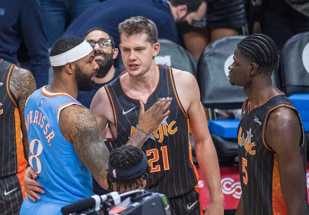 December 11, 2021, Los Angeles, California, USA: Moe Wagner 21 of the Orlando Magic chats with Marcus Morris 8 of the Los Angeles Clippers after their NBA, Basketball Herren, USA game on Saturday December 11, 2021 at the Staples Center in Los Angeles, California. Clippers defeat Magic, 106-104. PI Los Angeles USA - ZUMAp124 20211211_zaa_p124_034 Copyright: xARIANAxRUIZx