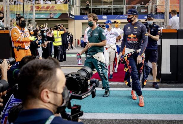 ABU DHABI Red Bull Racing s Sebastian Vettel and Max Verstappen arrive for the drivers parade during the Abu Dhabi Grand Prix at Yas Marina Circuit on December 12, 2021 in Abu Dhabi, United Arab Emirates REMKO DE WAAL F1 Grand Prix 2021 xVIxANPxSportx xxANPxIVx 441970580