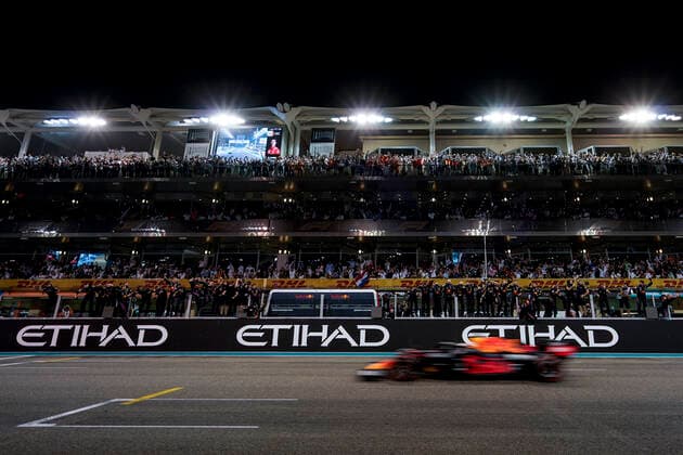 December 12, 2021, Abu Dhabi, United Arab Emirates: MAX VERSTAPPEN of the Netherlands and Red Bull Racing drives past the Red Bull Racing pit wall after winning the 2021 FIA Formula 1 Abu Dhabi Grand Prix and the 2021 Formula 1 World Championship, WM, Weltmeisterschaft at Yas Marina Circuit in Abu Dhabi, United Arab Emirates. Abu Dhabi United Arab Emirates - ZUMAg147 20211212_zap_g147_022 Copyright: xJamesxGasperottix