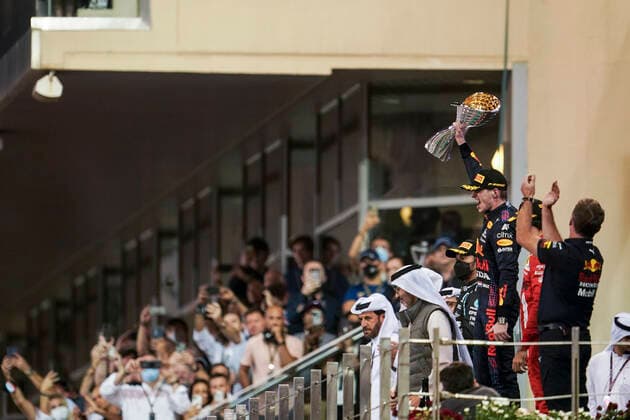 December 12, 2021, Abu Dhabi, United Arab Emirates: MAX VERSTAPPEN of the Netherlands and Red Bull Racing on the podium after winning the 2021 FIA Formula 1 Abu Dhabi Grand Prix and the 2021 Formula 1 World Championship, WM, Weltmeisterschaft at Yas Marina Circuit in Abu Dhabi, United Arab Emirates. Abu Dhabi United Arab Emirates - ZUMAg147 20211212_zap_g147_028 Copyright: xJamesxGasperottix
