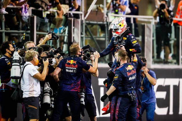 VERSTAPPEN Max (ned), Red Bull Racing Honda RB16B, portrait celebrating his world title during the Formula 1 Etihad Airways Abu Dhabi Grand Prix 2021, 22th round of the 2021 FIA Formula One World Championship, WM, Weltmeisterschaft from December 10 to 12, 2021 on the Yas Marina Circuit, in Yas Island, Abu Dhabi - F1 - ABU DHABI GRAND PRIX 2021 - RACE DPPI Panoramic  00121046__V2_3943
